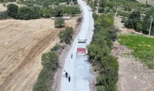 Manisa'da 1999’da açılan yol 27 yıl sonra asfaltla buluştu