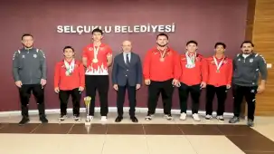 Selçuklu'dan uluslararası derecelerle dönen milli sporculara ödül
